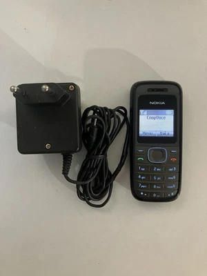 Telefono Cellulare NOKIA RH-105 Model 1208 - Funzionante con Caricabatterie - Immagine 1 di 4