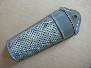 ANTIQUE TIN NUTMEG GRATER - HINGED LID STORAGE COMPARTMENT - 6.25" LONG - GOOD - Picture 1 of 4