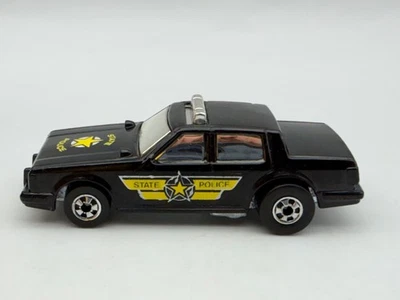 Hot Wheels Blackwall Flip Outs Coche de Policía Estatal, Negro, Hong Kong, Excelente Foto 1 de 4