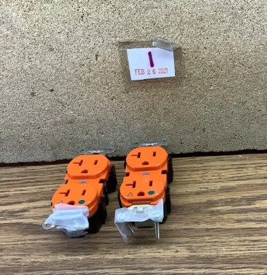 NOB Lot Of 2 Leviton 20A 125V 2P Receptacle Orange - Image 1 of 4