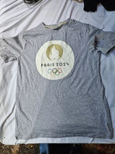 NEU 2024 Paris Olympische Sommerspiele Offizielles 100% Baumwolle T-Shirt Grau XXL - Bild 1 von 8