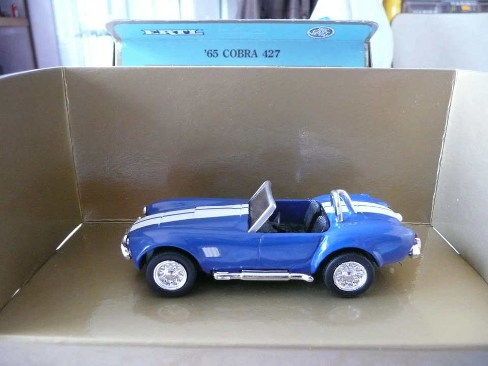 AC Cobra bleu 1965 ERTL 1/43 en boite - Photo 1/1