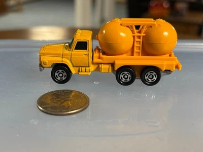 Camión Tomica Nissan diésel propano Foto 1 de 4
