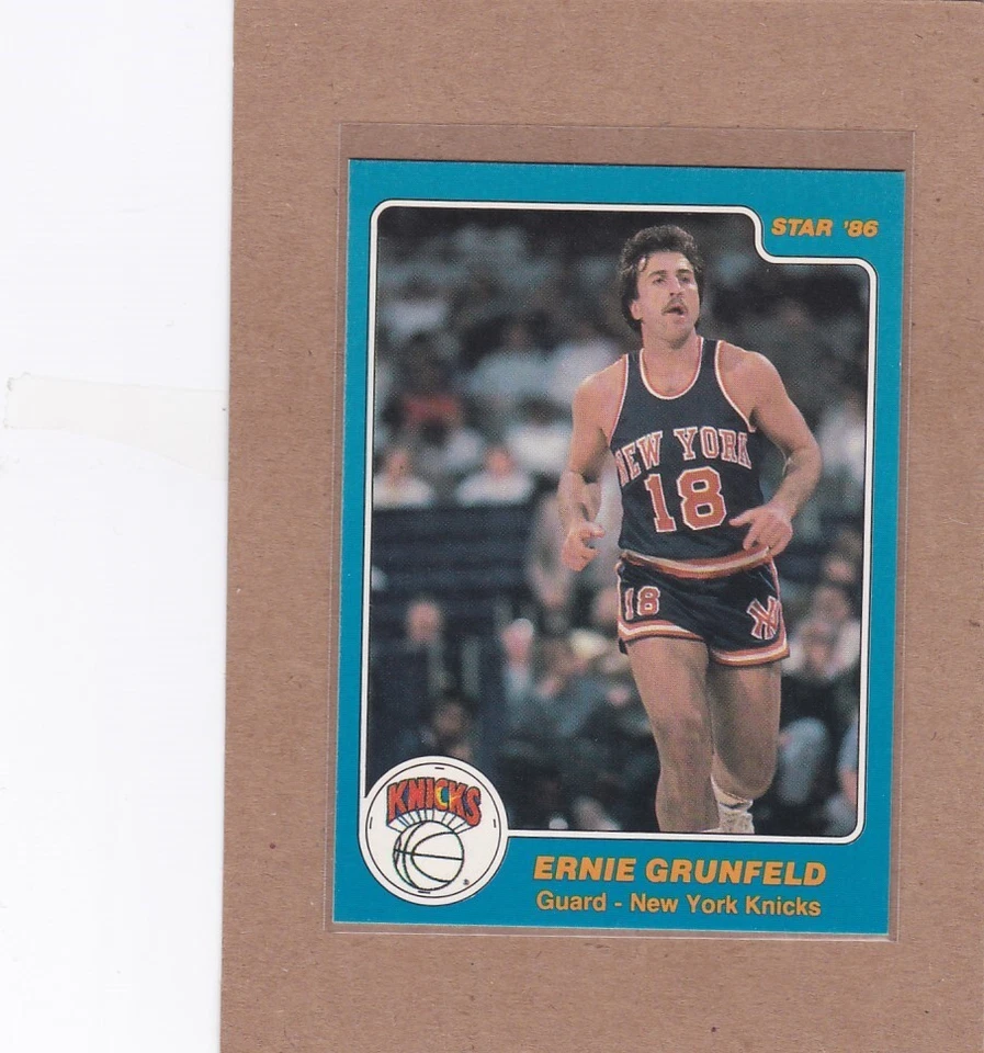 1985-86 STAR CO BASKETBALL ERNIE GRUNFELD #169 KNICKS NMMT OR BETTER *A24657 - Image 1 of 1