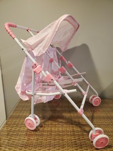 cochecito doble para muñecas