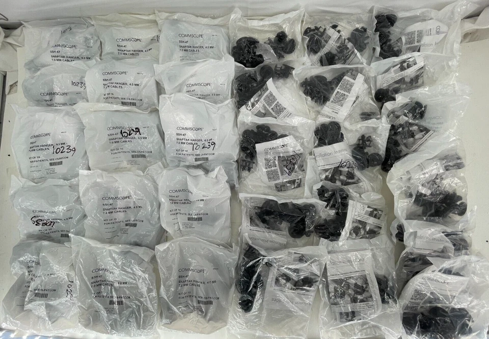 LOT of 31  Commscope Kit of 10 SSH-47 Snaptak Adjustable Hanger - Image 1 of 4