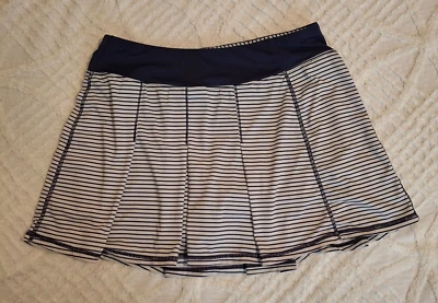 Falda Tenis Kyodan Para Mujer Mediana Azul Marino Blanco Rayas Skort Bolsillo para Pelota Foto 1 de 4