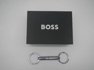 HUGO BOSS : PORTACHIAVI ACCIAIO LUCIDO/CANNA FUCILE FANTASIA RIGHE 2 ANELLI - Foto 1 di 2
