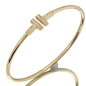 Auténtico brazalete de alambre Tiffany & Co. T después de diamante oro amarillo de 18 quilates tamaño grande - Imagen 1 de 7