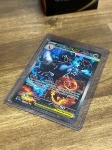 Mega Glurak X ex (PFL 125/094) con funda Toploader - Imagen 1 de 3