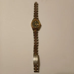 Vtg Pulsar Women’s Gold Silver Tone Date Indicator Quartz Watch V783-0030 Broken - Picture 1 of 14
