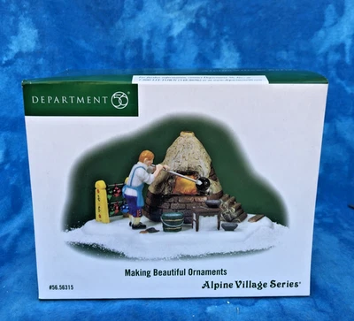 Soplador de vidrio Alpine Village "Haciendo hermosos adornos" Department 56 nuevo en caja Foto 1 de 4