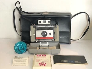 Polaroid 220 Land Camera SIGILLATA 669 pellicola modello 268 vintage flash istruzioni custodia - Foto 1 di 12