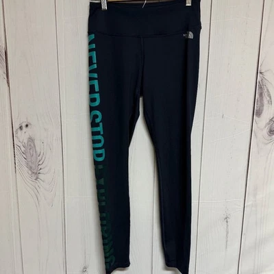 Leggings para mujer The North Face azul marino, gráficos Never Stop Exploring, usados en excelente estado, medianos Foto 1 de 4