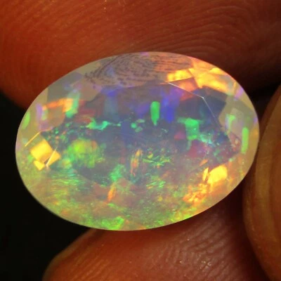 4.79Cts Natural Color Play Unheated White Opal Oval Cut Gemstone from Ethiopia - Image 1 of 4