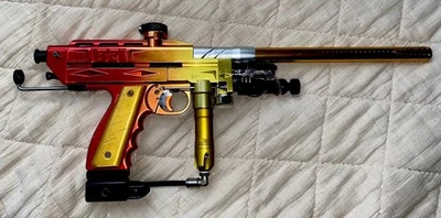 Pistola de paintball Cocker mecánica automática 32 grados marcador puesta de sol desvanecimiento ☼ Foto 1 de 4