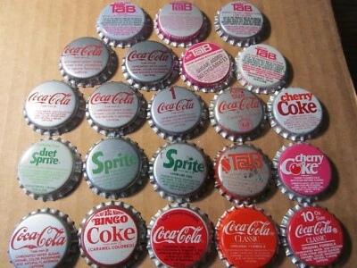 LOTE DE 2 TAPAS DE BOTELLAS DE REFRESCO SIN USAR 22 NUEVAS DIF COCA COLA EMBOTELLADO PESTAÑA DE COCA COLA Foto 1 de 4