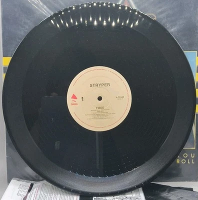 Stryper 12" Vinyl Single Free/Calling On You/The Rock That Makes Me Roll-SHRINK - Image 1 of 4