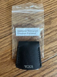 TUMI Leder Umschlag Monogramm zum Aufhängen schwarz NEU - Bild 1 von 5