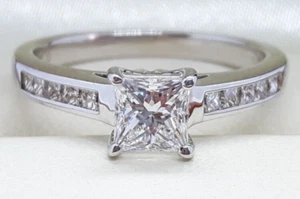 18ct White Gold 0.61ct Diamond Solitaire & 0.14ct accent engagement ring - Picture 1 of 16