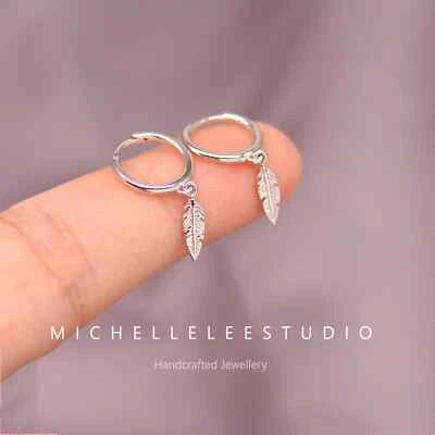 Sterling Silver Feather Huggie Hoop Earrings,Tiny Feather Charm Hoops - Image 1 of 4