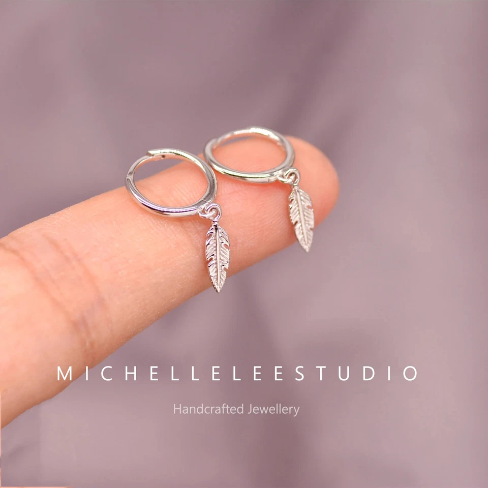 Sterling Silver Feather Huggie Hoop Earrings,Tiny Feather Charm Hoops - Image 1 of 4
