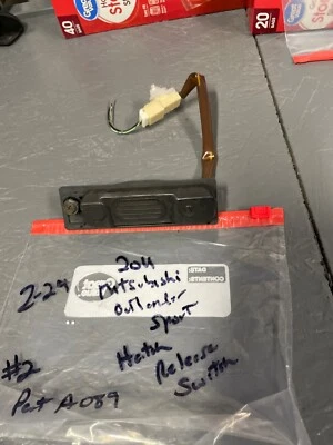 #2 11 - 21 MITSUBISHI OUTLANDER DEPORTIVO TAPA MALETERO ABRIDOR INTERRUPTOR DE LIBERACIÓN FABRICANTE DE EQUIPOS ORIGINALES - Usado Foto 1 de 4