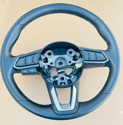 Volante de conductor Mazda 3 2014-2018 con interruptor de control de crucero de audio OEM negro Foto 1 de 4