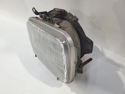 Faro delantero derecho Jeep Grand Wagoneer 1984 1985 1986 OEM con soporte  Foto 1 de 4