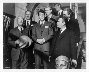 Dean Martin surveys the festivities while Martin Balsam watches hi- Old Photo - Picture 1 of 1