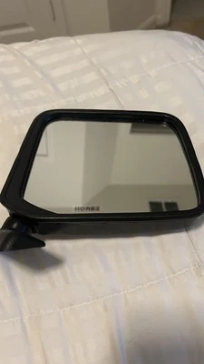 Espejo retrovisor pequeño lateral pasajero Nissan Datsun 720 1980-86 81 82 83 84 85 negro Foto 1 de 3