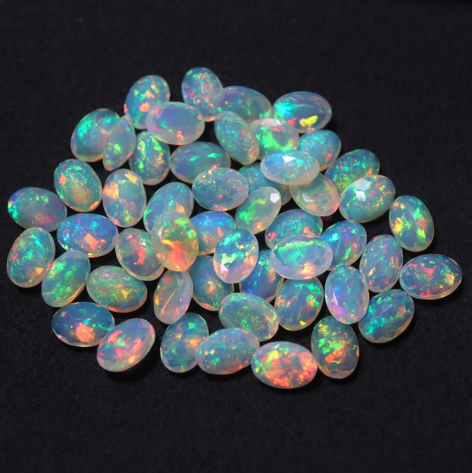 7x5 MM Oval Cut AAAA Flashy Rainbow Fire Natural Ethiopian Opal Wholesale Lot - Image 1 of 1