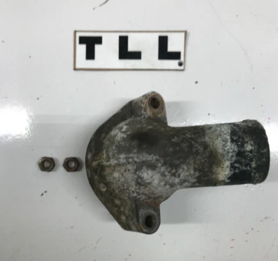 Volvo 463434 Thermostat housing 240 740 760 940 B19 B21 B23 B200 B230 4 cylinder Foto 1 de 4