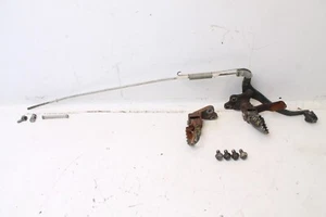 Yamaha XT350 1985 OEM Juego de estriberas delanteras estriberas reposapiés peldaños pedal de freno - Imagen 1 de 11