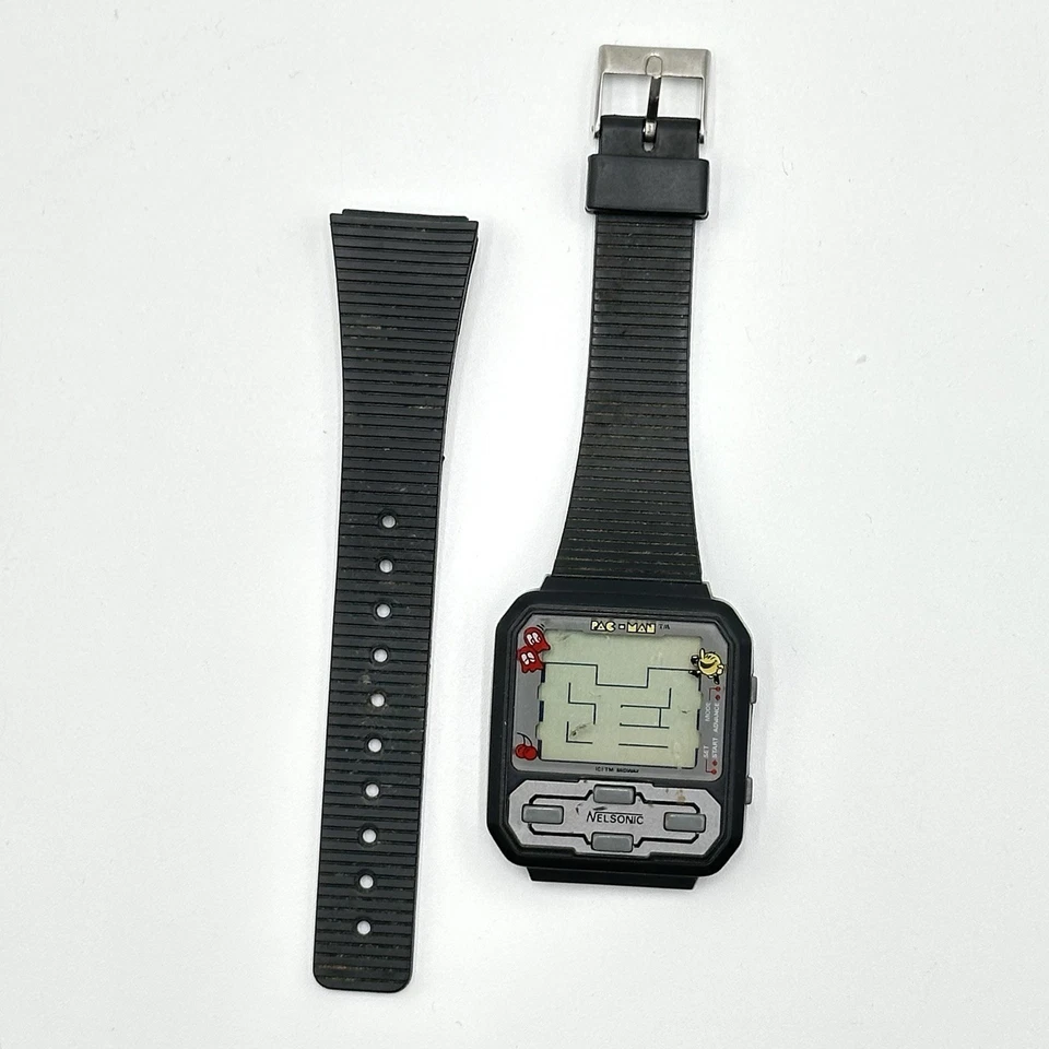 Часы с видеоиграми Nelsonic Midway Pac-Man на ЗАПЧАСТИ или РЕМОНТ 1980-е - Изображение 1 из 4