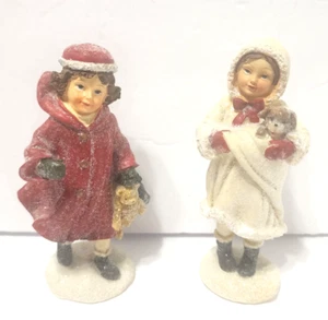 Bambole invernali in resina in miniatura per casa delle bambole o soprammobile - Foto 1 di 2