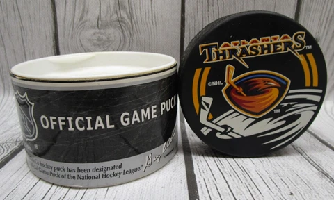 NHL Center Ice Official Game Puck Atlanta Thrashers In Tube by In Glas Co Cover