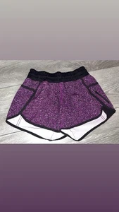 Pantalones Cortos Lululemon Talla 4 Rastreador Violeta Púrpura RARO Bolsillo con Cremallera Usados en Excelente Condición - Imagen 1 de 9
