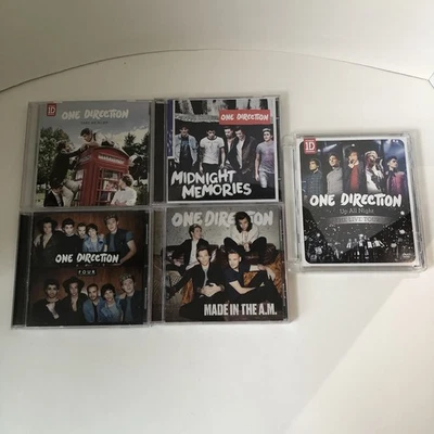 One Direction CDs: Made in the A.M./Four/Take Me Home/Midnight Memories Plus DVD - Image 1 of 4