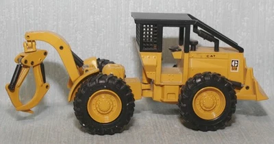 JOAL 226 1:43 CAT C-518 TRACTOR GRAPPLE SKIDDER  BOXED - Image 1 of 4