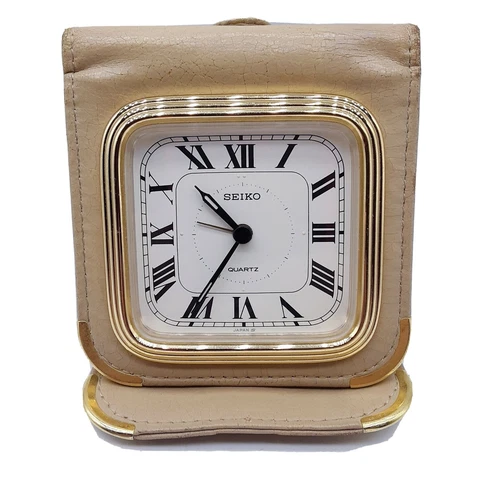 Vintage Seiko quartz Travel Clock with Leather cover gold tone Cover