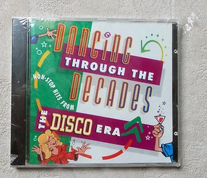 CD AUDIO MUSIQUE  / DANCING THROUGH THE DECADES "THE DISCO ERA" CD COMPILE NEUF  - Picture 1 of 2