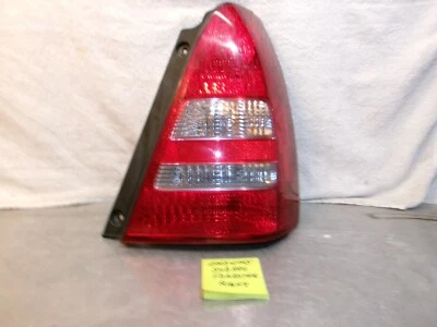 03 04 05 Conjunto de luz trasera derecha Subaru Forester OEM Foto 1 de 4
