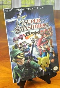 NUOVO Super Smash Bros Brawl Wii Videogioco Guida Strategica Smashbros PREMIERE ED - Foto 1 di 1