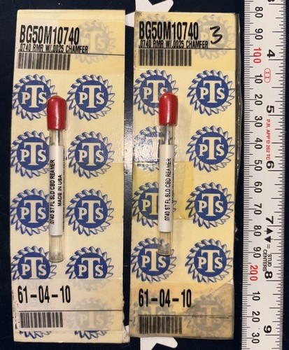 Two gold 2 X PTS .0740 solid carbide chucking reamers with red and white labels and blue star and oval PTS logo.