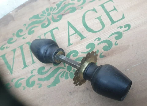One pair of old/vintage hardwood ebony? Tulip shape door handles & one backplate Cover