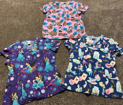 Disney Women's Scrub Top Size Large Aladdin Mickey Cinderella Lot Of 3  - Image 1 of 4
