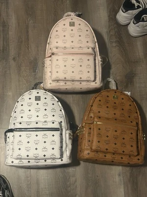 Mochilas MCM con monograma en blanco, rosa, marrón, cuero real Foto 1 de 4