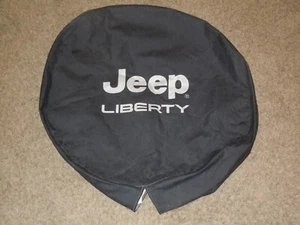2002-2007 Jeep Liberty Tire Cover Bright Silver Black w/Logo MOPAR GENUINE OEM - Picture 1 of 2