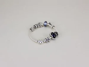 PANDORA ARMBAND 19cm 925er SILBER MIT MEHREREN CHARMS - Bild 1 von 4